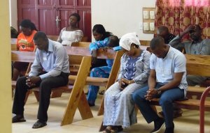 Praying at Egbe Hospital